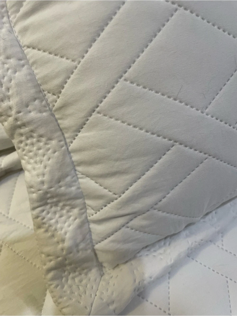 White king size quilted bedspread with shams